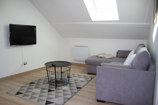 Loggia banquette et TV lecteur DVD/ gîte du canal